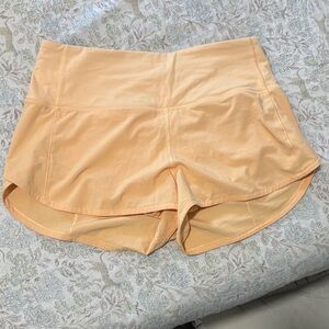 Lululemon speed up 
High-Waist Women's Athletic Shorts in Peach